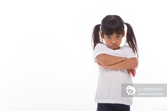 The angry little girl on a white background