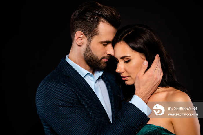 Close-up portrait of his he her she nice-looking attractive lovely sweet lovable delicate winsome glamorous luxurious two people caressing isolated over black background