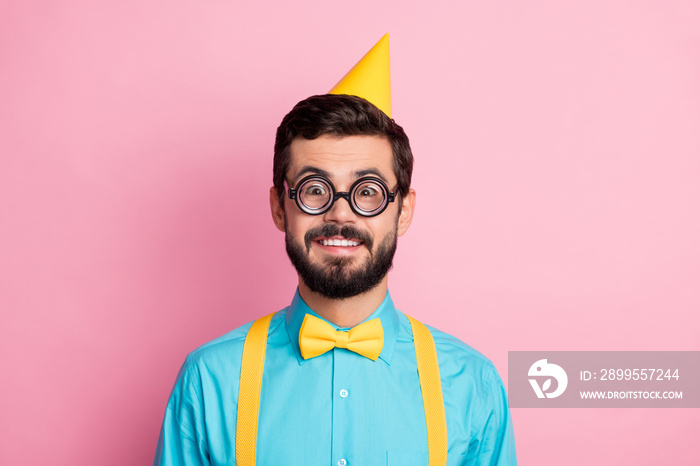 Close-up portrait of his he nice attractive funky childish comic cheerful cheery bearded guy nerd wearing festal look thin specs isolated over pastel pink color background