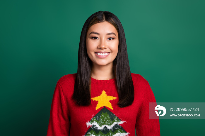 Photo of cheerful positive lady wear red ugly print xmas sweater smiling enjoying party isolated green color background