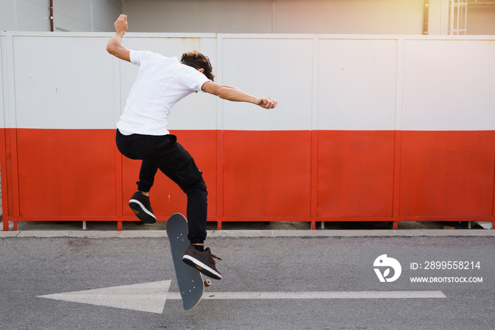 skateboarder does tricks outdoors