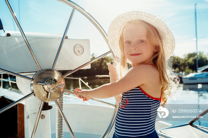 The children on board of sea yacht