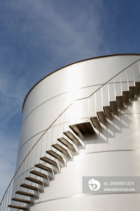 Staircase along steel storage tank