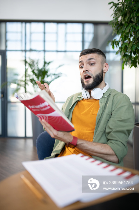 Student reading out loud while studying foreign language