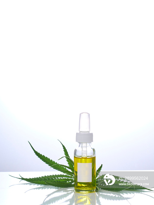 Cannabis with extract oil in a bottle