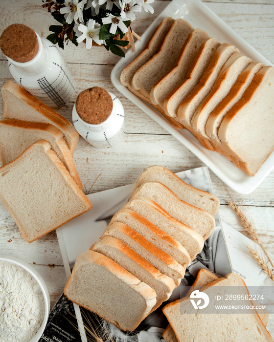 sliced white bread on the wooden table