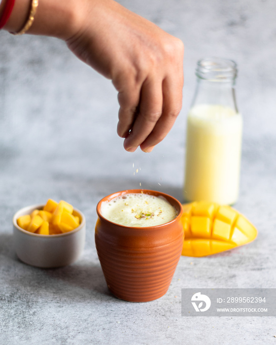 Mango Lassi - Yoghurt and mango based sweet beverage