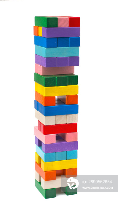 Tower from colorful wooden blocks isolated on white