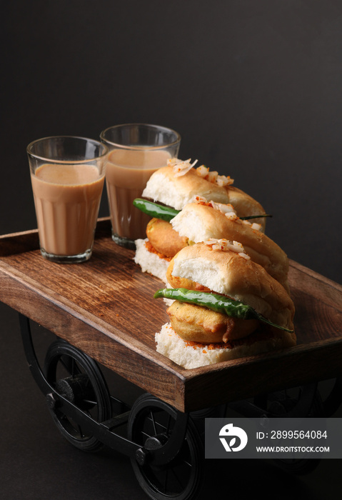 Masala cutting chai and Bombay vada paav is an indian burger. Potato patty is deep fried in gram flour or besan batter it is served hot with paav or bun like sandwich.