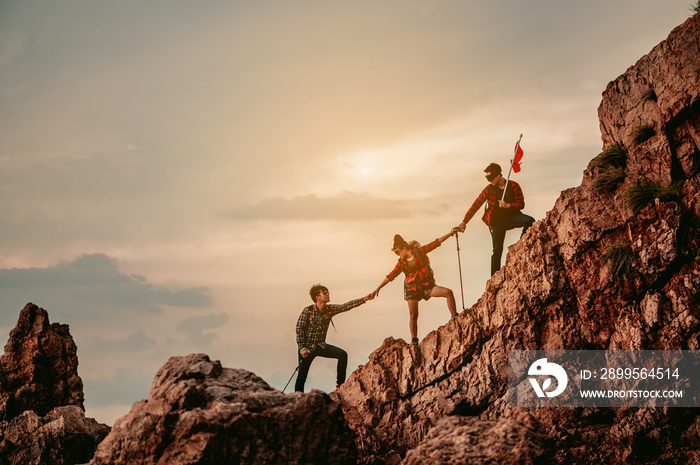 Group of team people helping work on peak mountain climbing teamwork , travel trekking winner success business concept