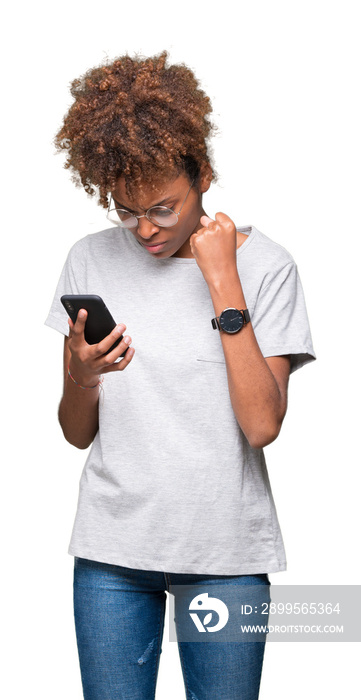 Young african american woman using smartphone over isolated background annoyed and frustrated shouting with anger, crazy and yelling with raised hand, anger concept