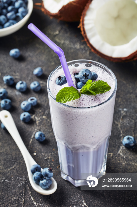 close-up of a fresh blueberry frothy milkshake