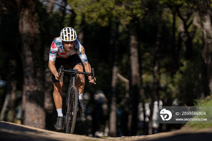 Determined cyclocross athlete on a sunny day