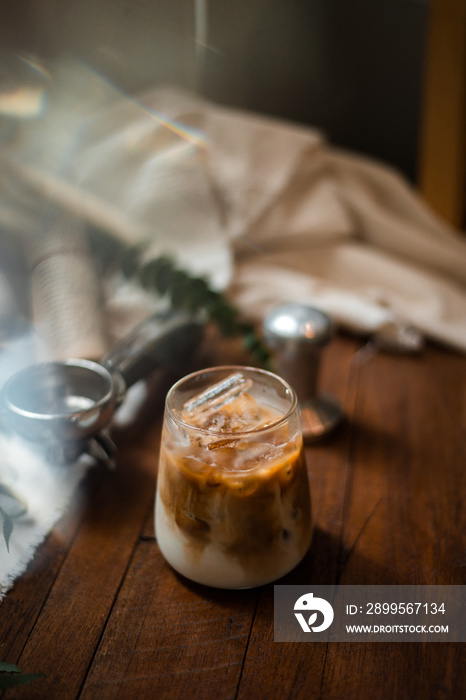 cold brew coffee with milk on wooden table