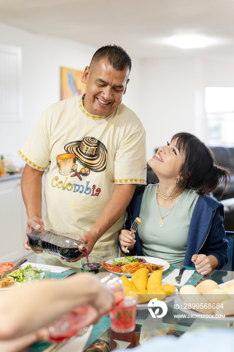 Family enjoying lunch in dining room