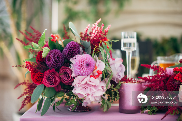 Purple bouquet of asters, roses and dahlias