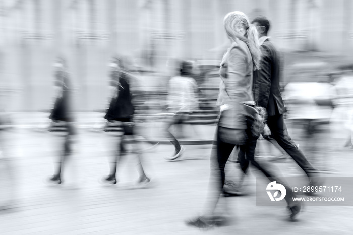 group of business people in the street in monochrome blue tonality