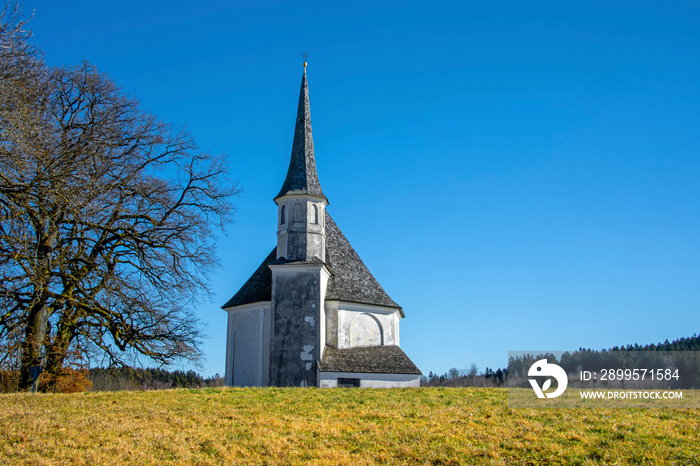 Beautiful chapel on a winter day against the blue sky