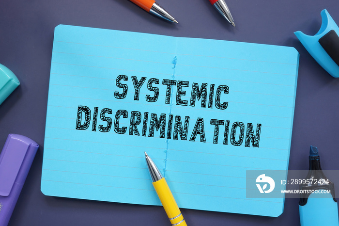 Financial concept about Systemic Discrimination with phrase on the piece of paper.