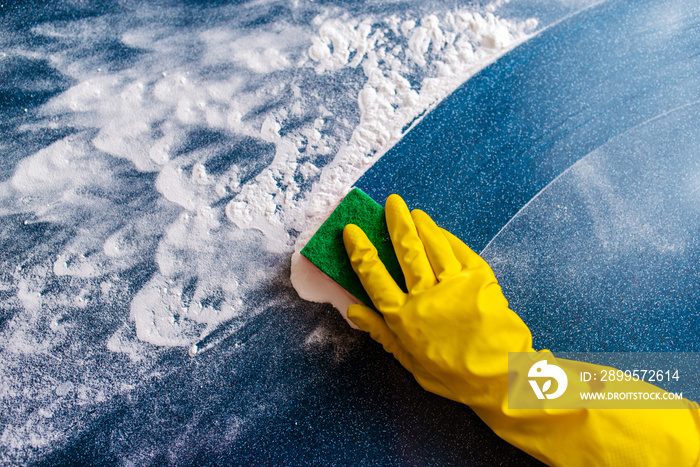 Washing and cleaning the house with your hands with a sponge.