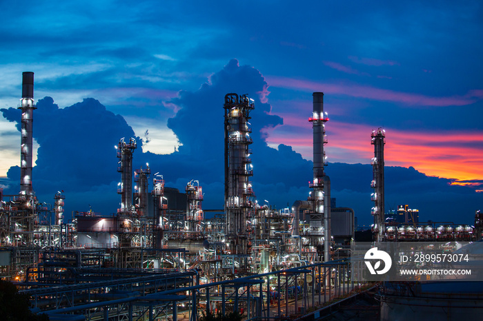 Oil​ refinery ​ and​ plant tower column refinery of petrochemistry industry in oil​ and​ gas​ ​industry with​ cloud​ blue​ ​sky cloud the twilight.