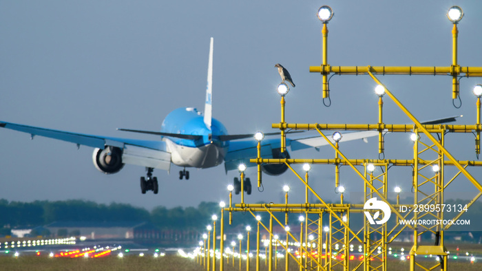 A passenger aircraft lands on Schiphol runway 36L (Polderbaan) at Schiphol Airport