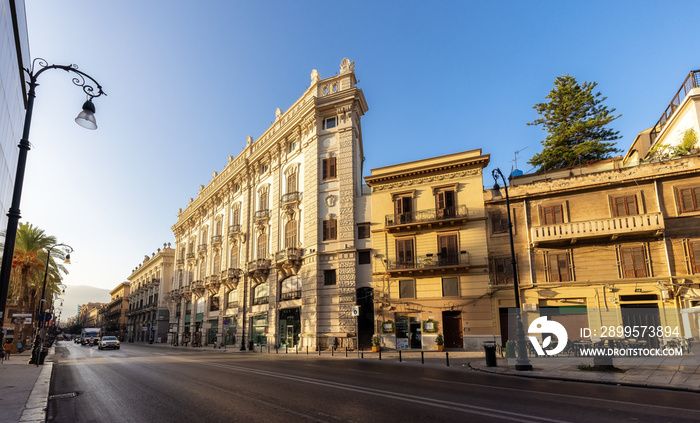 Old Residential Homes in Urban Downton city streets in Palermo, Sicily, Italy. Sunny Sunrise Sky.