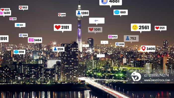 Social media icons fly over city downtown showing people engagement connection through social network application platform . Concept for online community and social media marketing strategy .