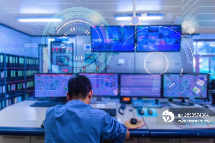 Double exposure Blurred light of man Engineering operations checking production process, Control room of a steam Turbine, Generators in the coal-fired power plant. Technology and industry concept