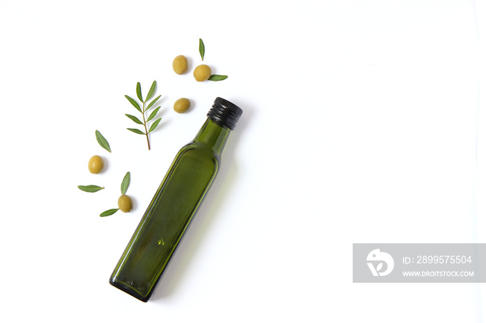 olive oil in a bottle on a white background top view.