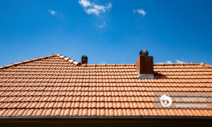 new red tiles roof and blue sky