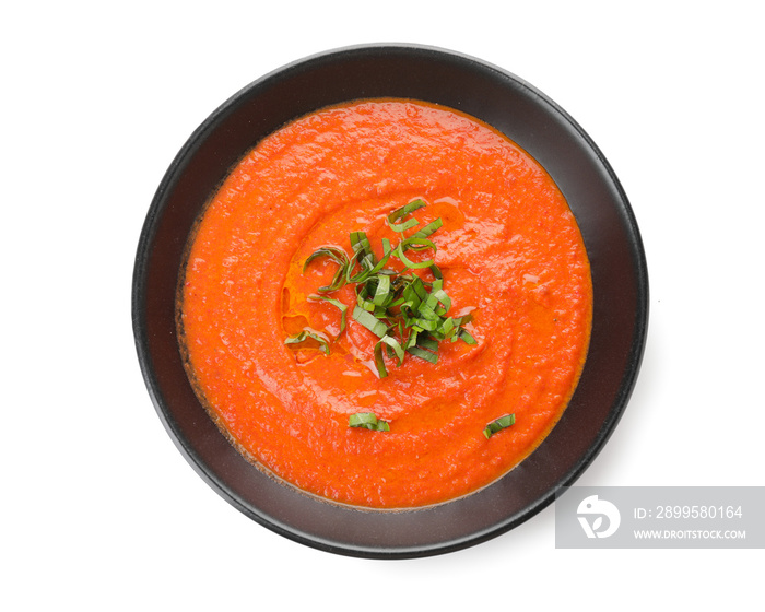 Bowl of tomato cream soup isolated  on  white background