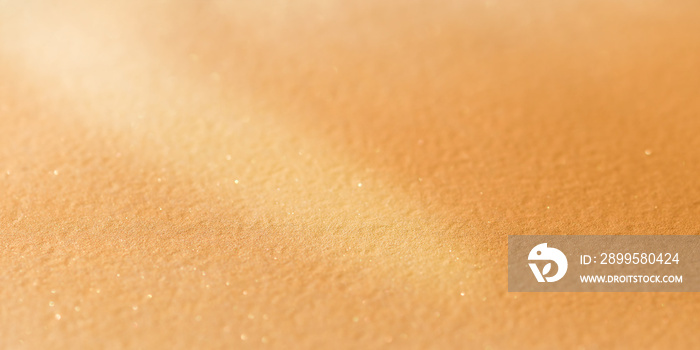 Defocused Golden glitter background, Blurred sparkle sand background, Texture of Gold Design Paper