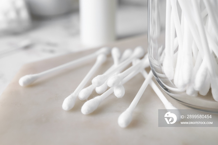 Cotton swabs on light background