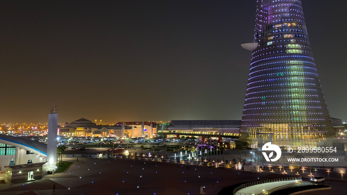 Scenic view of Villagio Mall and Torch Tower in Doha, Qatar, at night.