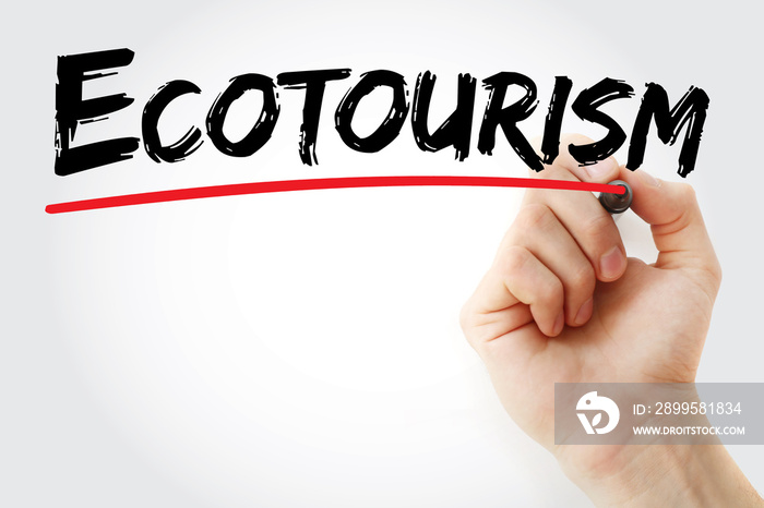 Hand writing ecotourism with marker, concept background