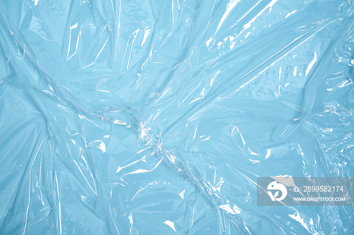 Clear plastic texture with blue color. Nylon polythene wrap. Plastic free lifestyle, ecology pollution