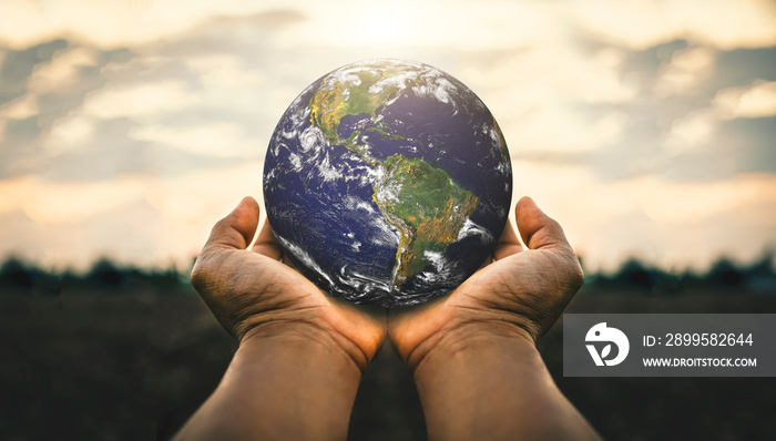 Hand of a man holding the earth, 22 april earth day concept, Elements of this image furnished by NASA.