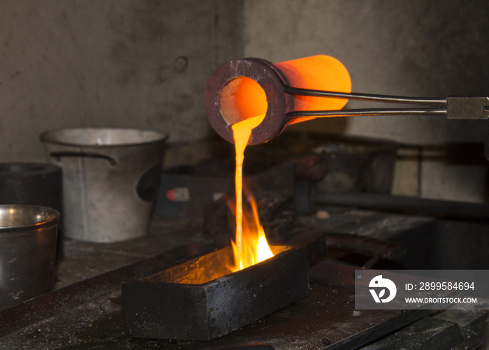 gold casting - pouring liquid gold