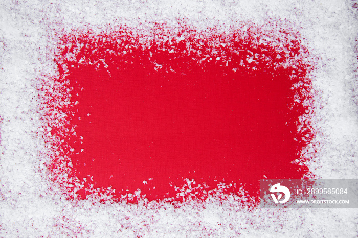 Christmas red background with snow frame. Winter, festive holiday mock up, copy space. Abstract red christmas background.