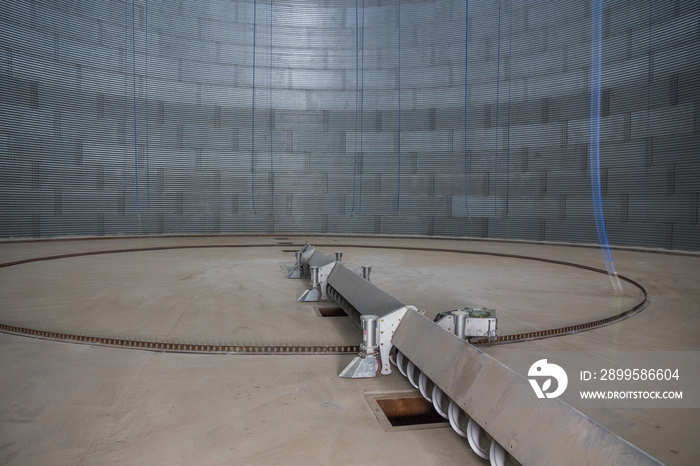 Grain storage silo inside view. Silo bottom. Storage of bulk food products.