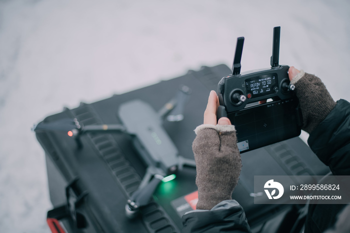 On the set, a professional copter, drone. Shooting shift, equipment and group. Technique of modern photography.