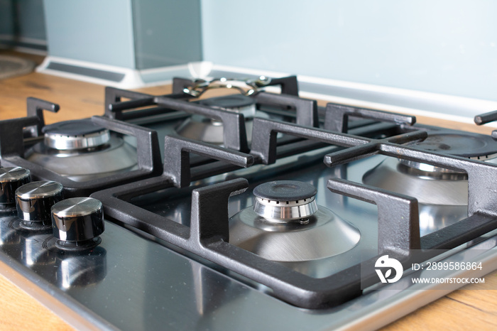 Modern gas stove with stainless steel and pan