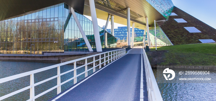 Panorama of the Linnaeusborg building and bridge in Groningen, Netherlands