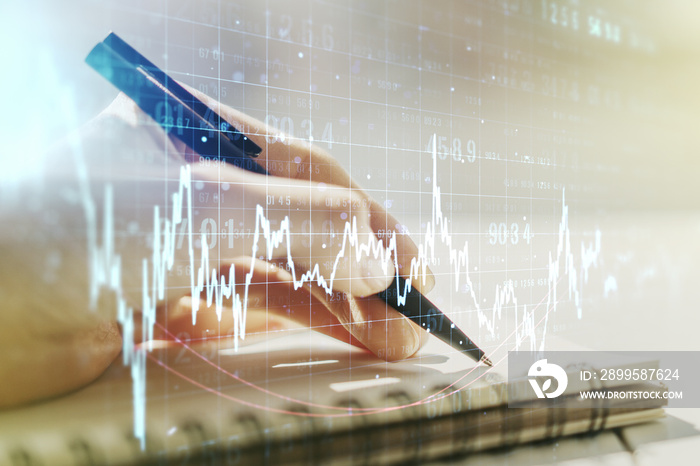 Multi exposure of abstract financial diagram with hand writing in notepad on background, banking and accounting concept