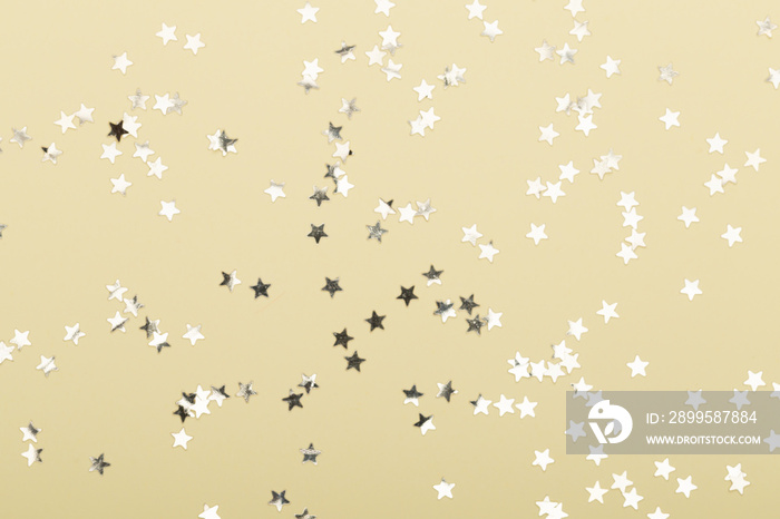 Christmas composition. Christmas golden glittering decorations on color background. Flat lay, top view, copy space - Image