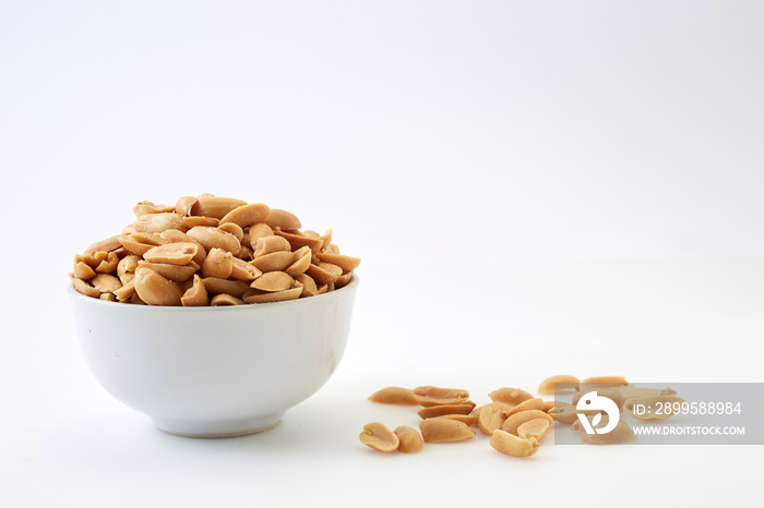 Roasted peanuts and salt in a bowl