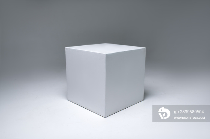 white cube on white background. photo studio equipment. White cyclorama.