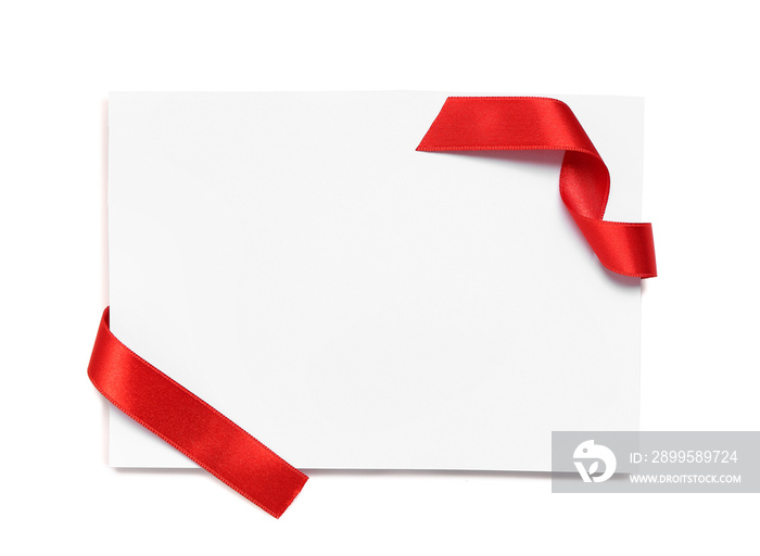 Blank card with red satin ribbon isolated on white background