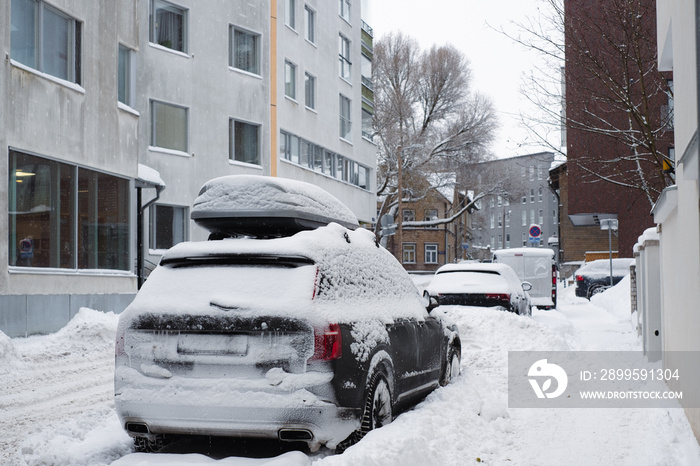 Slippery snowy city road  during winter.